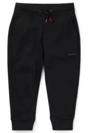 Pantalones de chándal para niños en algodón con estampado de logo